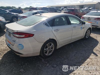 Trzecie zdjęcie samochodu z tyłu: 2018 FORD FUSION SE HYBRID VIN:3FA6P0LU3JR129927 - miniatura