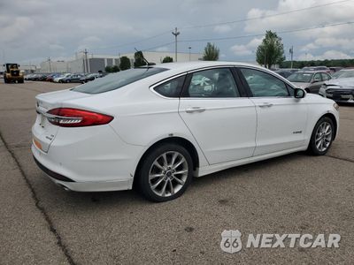 Trzecie zdjęcie samochodu z tyłu: 2017 FORD FUSION SE HYBRID VIN:3FA6P0LU3HR409146 - miniatura
