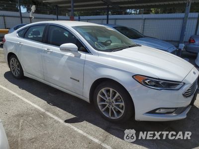 Czwarte zdjęcie samochodu z boku: 2017 FORD FUSION SE HYBRID VIN:3FA6P0LU6HR408959 - miniatura