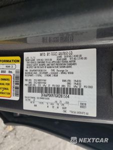 Zdjęcie 12 z 14 samochodu: 2016 FORD FUSION TITANIUM VIN:3FA6P0K97GR281554 - miniatura