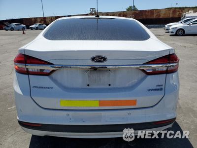 Zdjęcie 6 z 13 samochodu: 2018 FORD FUSION SE HYBRID VIN:3FA6P0LU3JR172132 - miniatura