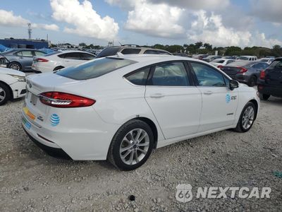 Trzecie zdjęcie samochodu z tyłu: 2019 FORD FUSION SE VIN:3FA6P0LU1KR285112 - miniatura