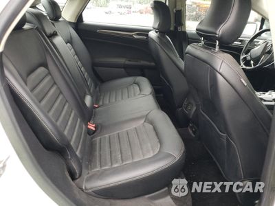 Zdjęcie 10 z 12 samochodu: 2018 FORD FUSION SE HYBRID VIN:3FA6P0LU7JR171775 - miniatura
