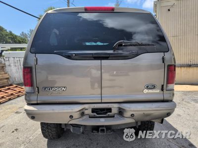 Zdjęcie 12 z 15 samochodu: 2004 FORD EXCURSION LIMITED VIN:1FMSU43P44EA56041 - miniatura