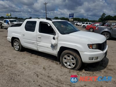 Czwarte zdjęcie samochodu z boku: 2014 HONDA RIDGELINE RTL-S VIN:5FPYK1F65EB006617 - miniatura