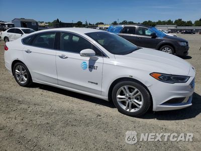 Czwarte zdjęcie samochodu z boku: 2018 FORD FUSION SE HYBRID VIN:3FA6P0LU2JR171540 - miniatura
