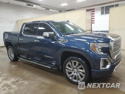 Czwarte zdjęcie samochodu z boku: 2019 GMC SIERRA K1500 DENALI VIN:3GTU9FED2KG290620 - miniatura