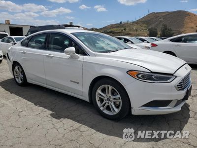 Czwarte zdjęcie samochodu z boku: 2018 FORD FUSION SE HYBRID VIN:3FA6P0LU1JR171710 - miniatura