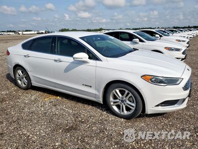Czwarte zdjęcie samochodu z boku: 2018 FORD FUSION SE HYBRID VIN:3FA6P0LU5JR171676 - miniatura
