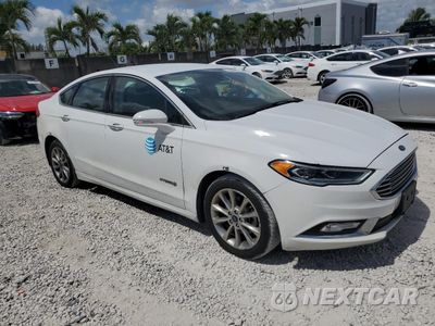 Czwarte zdjęcie samochodu z boku: 2017 FORD FUSION SE HYBRID VIN:3FA6P0LU5HR409469 - miniatura