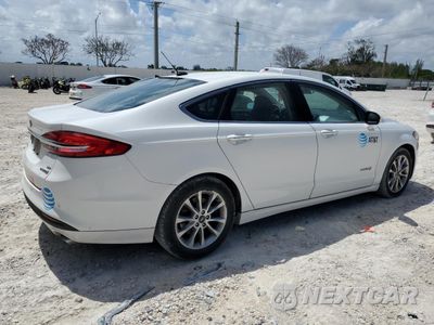 Trzecie zdjęcie samochodu z tyłu: 2017 FORD FUSION SE HYBRID VIN:3FA6P0LU1HR359573 - miniatura