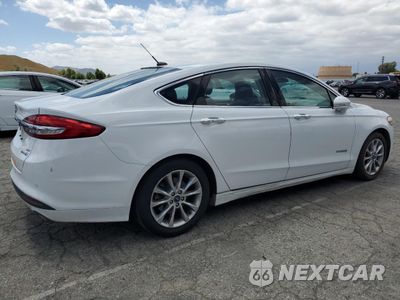 Trzecie zdjęcie samochodu z tyłu: 2017 FORD FUSION SE HYBRID VIN:3FA6P0LU3HR409695 - miniatura