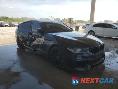 Czwarte zdjęcie samochodu z boku: 2019 BMW M550XI VIN:WBAJB9C51KB288125 - miniatura