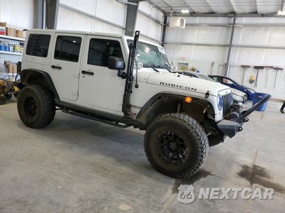 Czwarte zdjęcie samochodu z boku: 2015 JEEP WRANGLER UNLIMITED RUBICON VIN:1C4BJWFG1FL750561 - miniatura