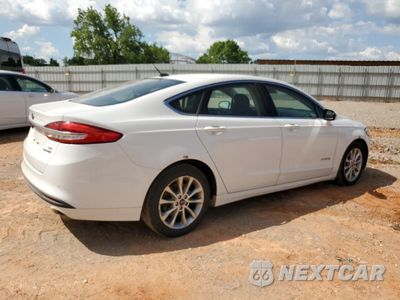 Trzecie zdjęcie samochodu z tyłu: 2017 FORD FUSION SE HYBRID VIN:3FA6P0LU1HR409632 - miniatura
