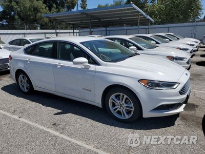 Czwarte zdjęcie samochodu z boku: 2018 FORD FUSION SE HYBRID VIN:3FA6P0LU0JR118870 - miniatura