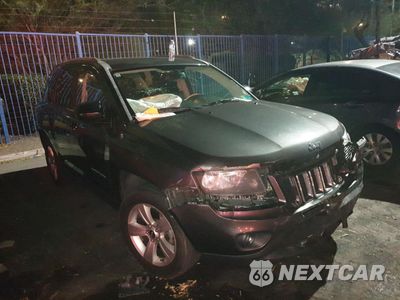 Czwarte zdjęcie samochodu z boku: 2016 JEEP COMPASS SPORT VIN:1C4NJDBB2GD566687 - miniatura