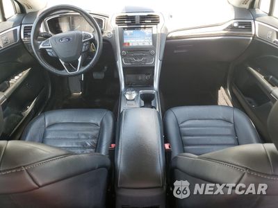 Zdjęcie 8 z 12 samochodu: 2017 FORD FUSION SE HYBRID VIN:3FA6P0LU3HR359543 - miniatura