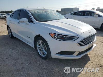Czwarte zdjęcie samochodu z boku: 2018 FORD FUSION SE HYBRID VIN:3FA6P0LU9JR129950 - miniatura
