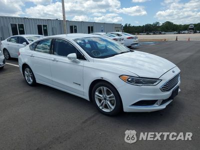 Czwarte zdjęcie samochodu z boku: 2018 FORD FUSION SE HYBRID VIN:3FA6P0LU0JR118626 - miniatura
