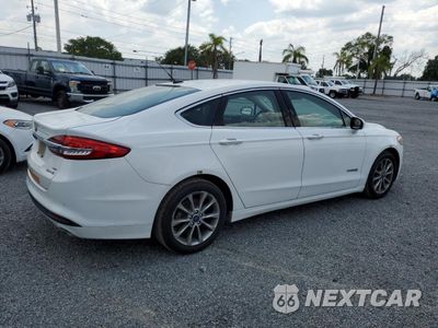 Trzecie zdjęcie samochodu z tyłu: 2017 FORD FUSION SE HYBRID VIN:3FA6P0LUXHR409645 - miniatura