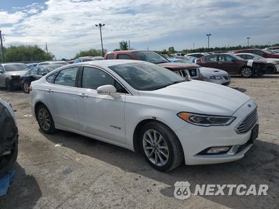 Czwarte zdjęcie samochodu z boku: 2017 FORD FUSION SE HYBRID VIN:3FA6P0LU7HR359612 - miniatura