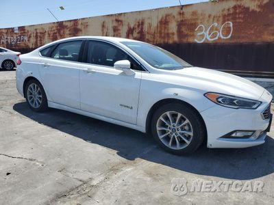 Czwarte zdjęcie samochodu z boku: 2017 FORD FUSION SE HYBRID VIN:3FA6P0LU7HR409327 - miniatura