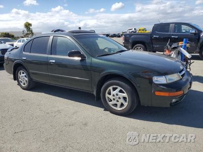 Czwarte zdjęcie samochodu z boku: 1999 NISSAN MAXIMA GLE VIN:JN1CA21D3XT809866 - miniatura