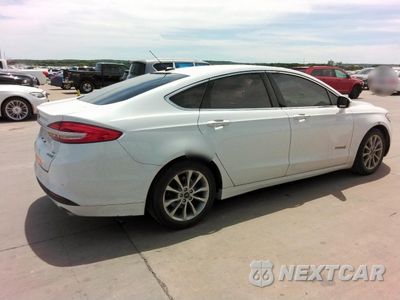 Trzecie zdjęcie samochodu z tyłu: 2017 FORD FUSION SE HYBRID VIN:3FA6P0LUZHR410061 - miniatura