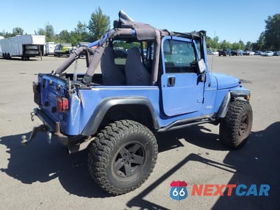 Trzecie zdjęcie samochodu z tyłu: 1997 JEEP WRANGLER / TJ SE VIN:1J4FY29P7VP459694 - miniatura