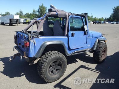 Trzecie zdjęcie samochodu z tyłu: 1997 JEEP WRANGLER / TJ SE VIN:1J4FY29P7VP459694 - miniatura