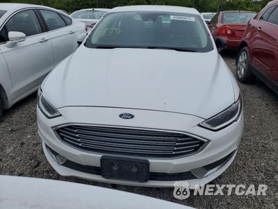 Piąte zdjęcie samochodu w środku: 2018 FORD FUSION SE HYBRID VIN:3FA6P0LU5JR172018 - miniatura
