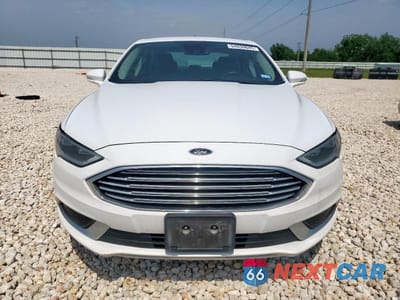 Piąte zdjęcie samochodu w środku: 2018 FORD FUSION SE HYBRID VIN:3FA6P0LUXJR171575 - miniatura