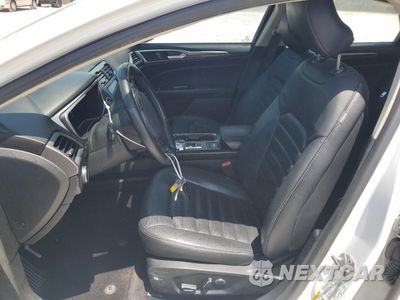 Zdjęcie 7 z 12 samochodu: 2017 FORD FUSION SE HYBRID VIN:3FA6P0LU0HR359631 - miniatura