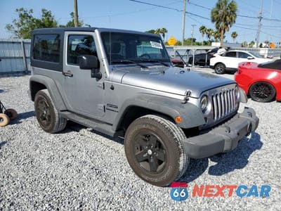 Czwarte zdjęcie samochodu z boku: 2015 JEEP WRANGLER SPORT VIN:1C4AJWAG4FL740299 - miniatura