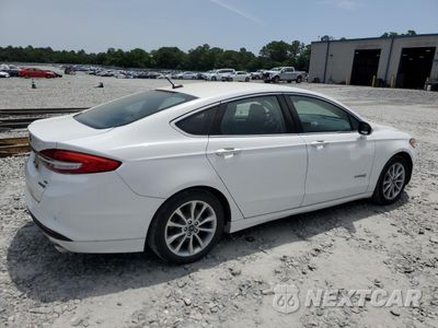 Trzecie zdjęcie samochodu z tyłu: 2017 FORD FUSION SE HYBRID VIN:3FA6P0LU0HR409654 - miniatura
