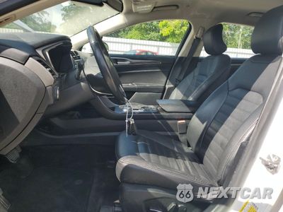 Zdjęcie 7 z 12 samochodu: 2017 FORD FUSION SE HYBRID VIN:3FA6P0LU8HR400703 - miniatura
