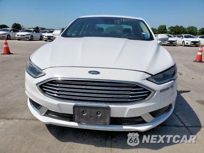 Piąte zdjęcie samochodu w środku: 2018 FORD FUSION SE HYBRID VIN:3FA6P0LU6JR171654 - miniatura