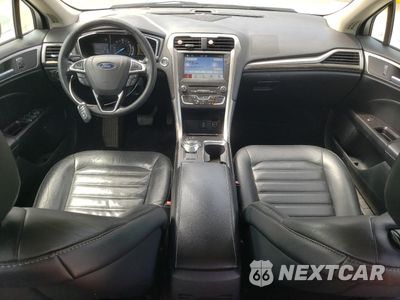 Zdjęcie 8 z 12 samochodu: 2018 FORD FUSION SE HYBRID VIN:3FA6P0LU6JR118761 - miniatura