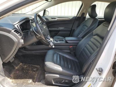 Zdjęcie 7 z 12 samochodu: 2017 FORD FUSION SE HYBRID VIN:3FA6P0LUXHR409516 - miniatura