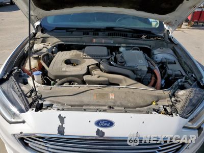 Zdjęcie 11 z 13 samochodu: 2018 FORD FUSION SE HYBRID VIN:3FA6P0LU7JR129798 - miniatura