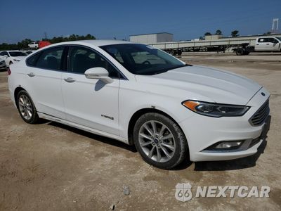 Czwarte zdjęcie samochodu z boku: 2017 FORD FUSION SE HYBRID VIN:3FA6P0LUXHR409130 - miniatura