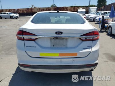 Zdjęcie 6 z 13 samochodu: 2018 FORD FUSION SE HYBRID VIN:3FA6P0LU3JR129961 - miniatura