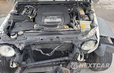 Zdjęcie 7 z 10 samochodu: 2013 JEEP WRANGLER UNLIMITED SPORT VIN:1C4BJWDG6DL582321 - miniatura