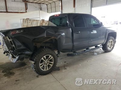 Trzecie zdjęcie samochodu z tyłu: 2016 CHEVROLET SILVERADO K1500 LT VIN:1GCVKREC5GZ155642 - miniatura