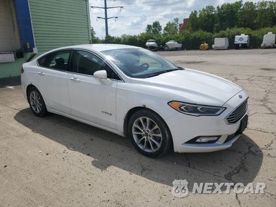 Czwarte zdjęcie samochodu z boku: 2017 FORD FUSION SE HYBRID VIN:3FA6P0LU6HR359648 - miniatura