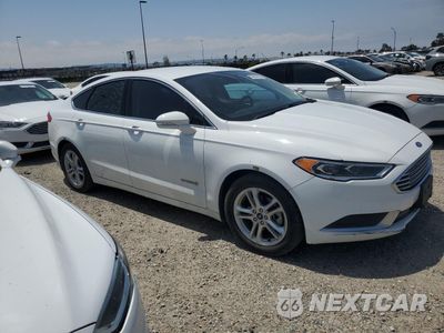 Czwarte zdjęcie samochodu z boku: 2018 FORD FUSION SE HYBRID VIN:3FA6P0LU9JR278617 - miniatura