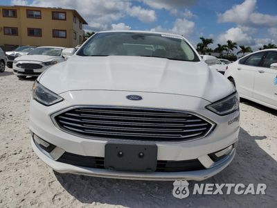 Piąte zdjęcie samochodu w środku: 2017 FORD FUSION SE HYBRID VIN:3FA6P0LU6HR409416 - miniatura