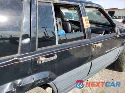 Zdjęcie 10 z 13 samochodu: 1997 JEEP GRAND CHEROKEE LAREDO VIN:1J4GZ58S1VC707714 - miniatura