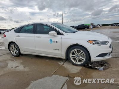 Czwarte zdjęcie samochodu z boku: 2018 FORD FUSION SE HYBRID VIN:3FA6P0LU5JR118668 - miniatura